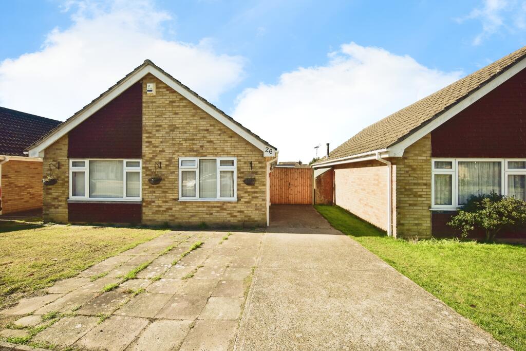 Outside View Of The Property With Driveway Parking