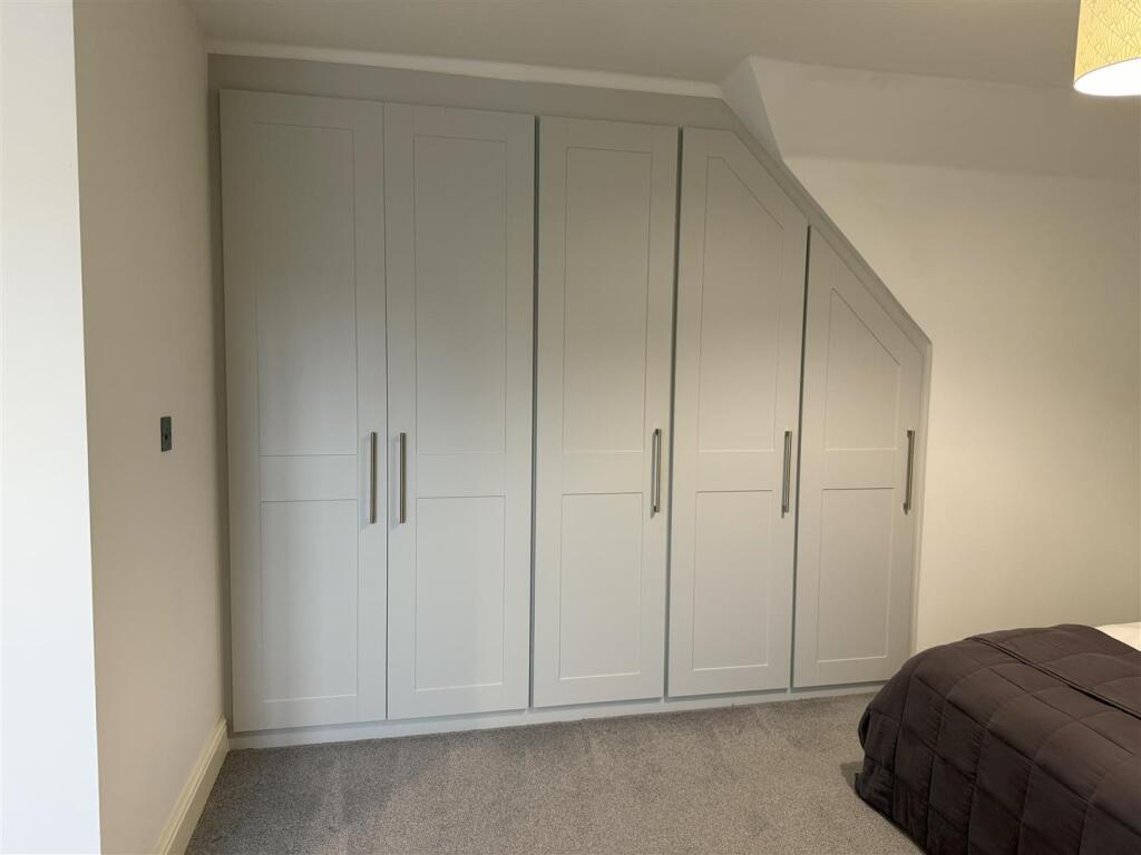 Bedroom 1 wardrobes.jpeg