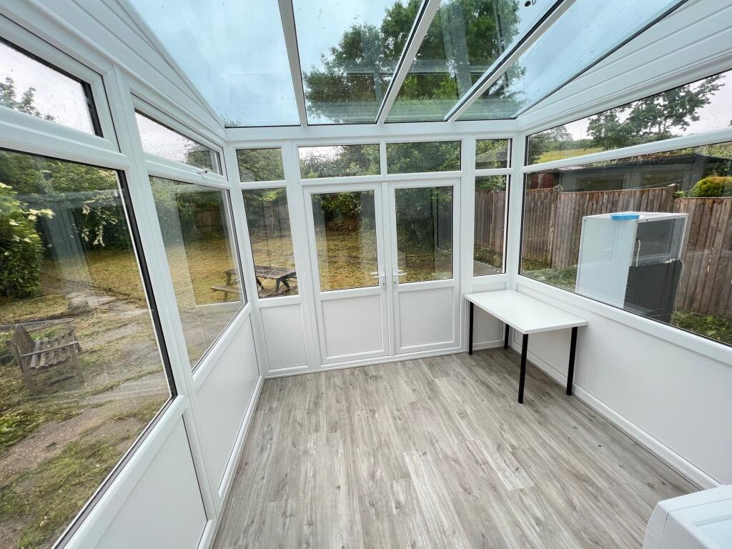 Bright and airy conservatory-style living space...