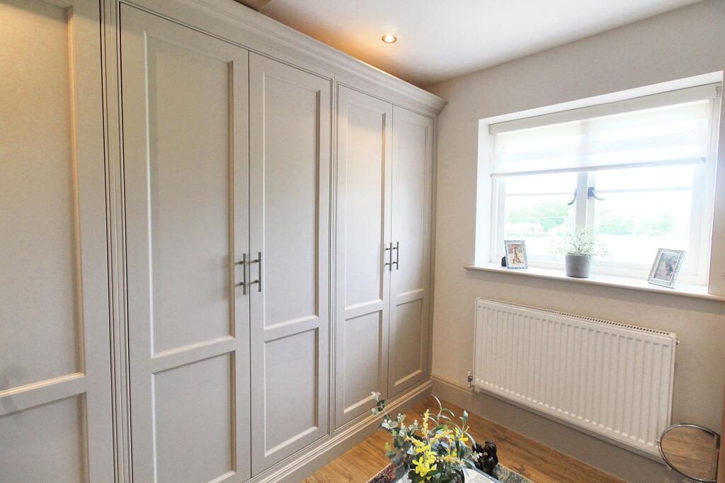 BEDROOM THREE / WALK IN CLOSET