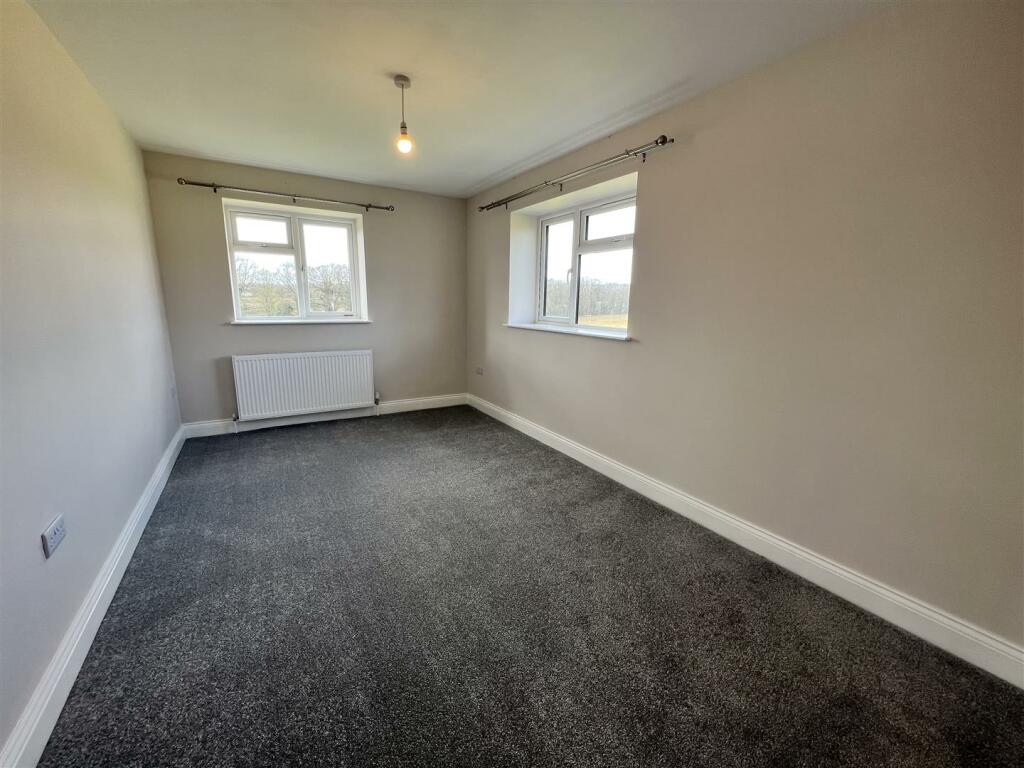 SECOND BEDROOM
