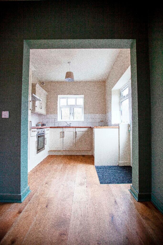 A cozy kitchen with ample natural light, perfec...