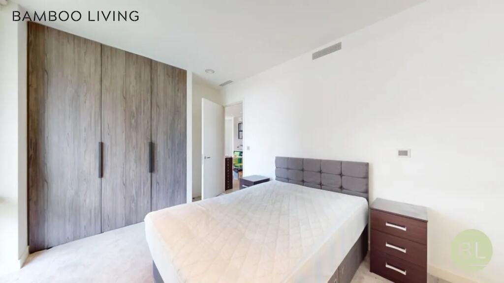 Bright and modern double bedroom featuring a co...