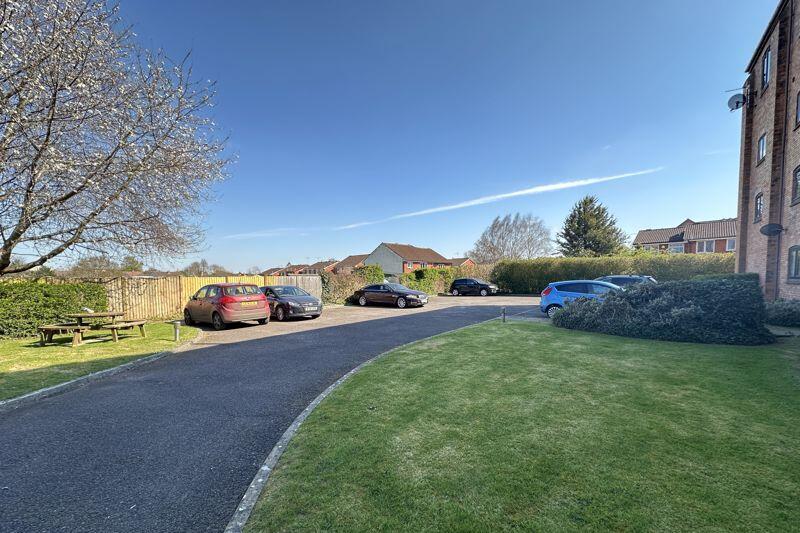 Parking area/communal garden