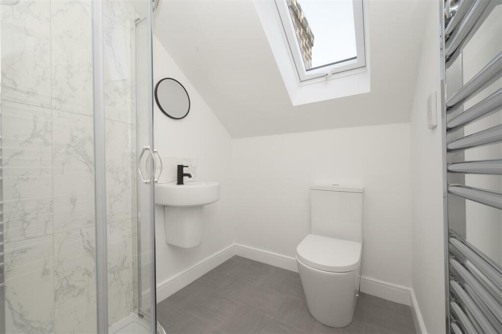 Bedroom Three - en-suite shower room.jpg