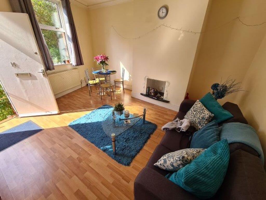 A spacious and inviting living room with large ...
