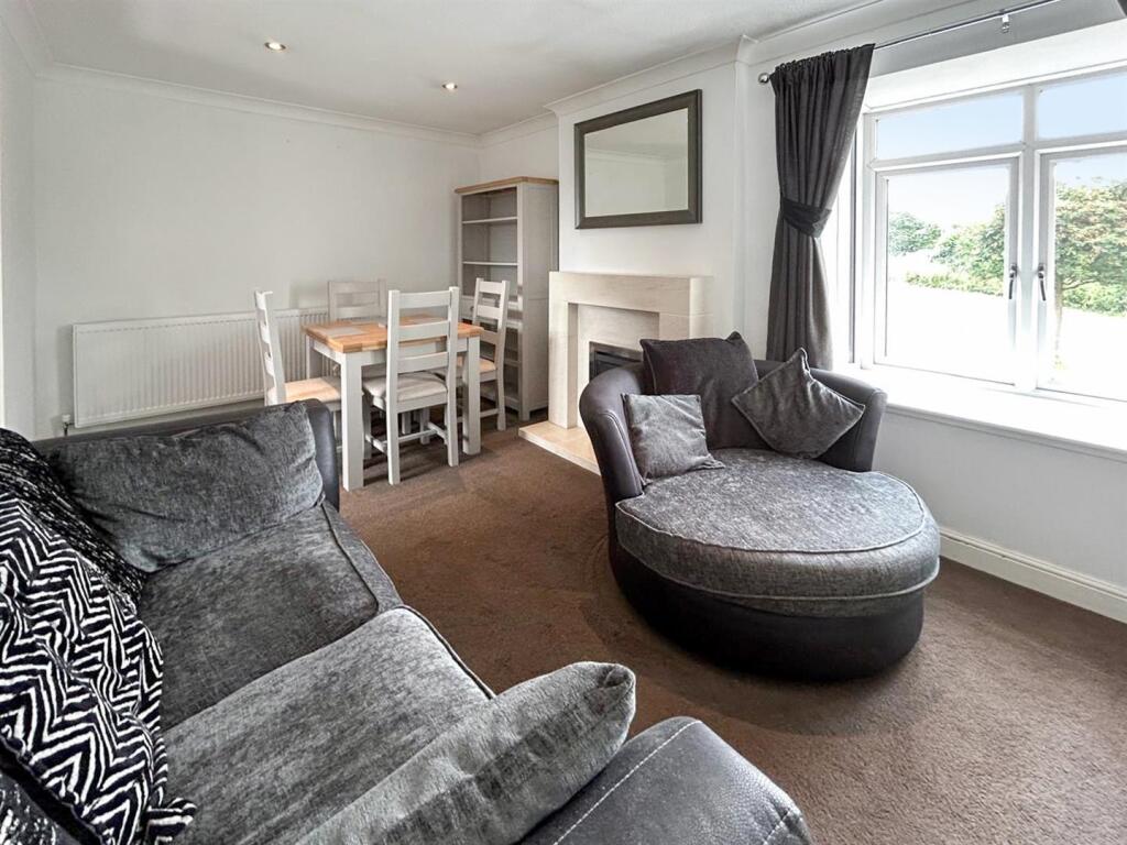 Living Room &amp; Dining Area: