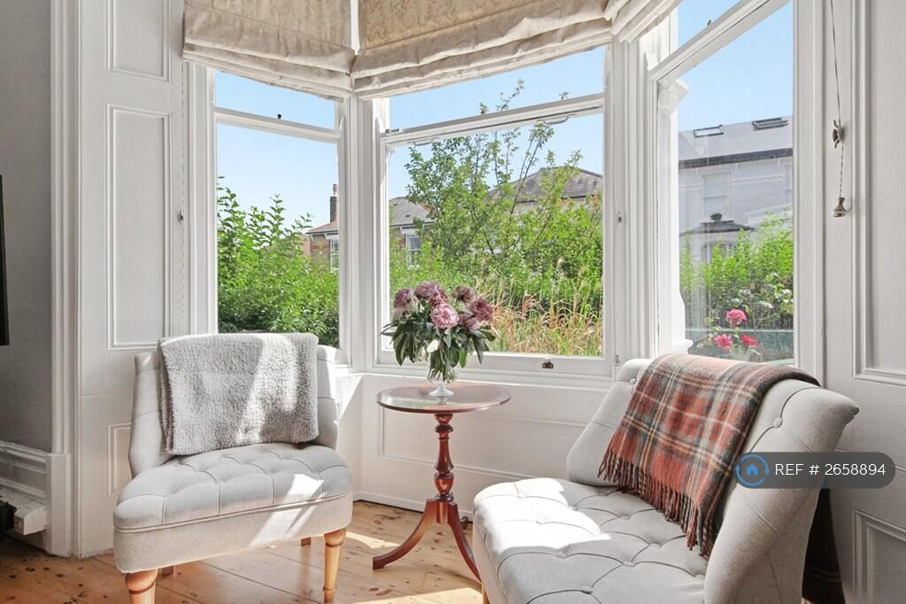 Large Front Bay Window With Roman Blinds