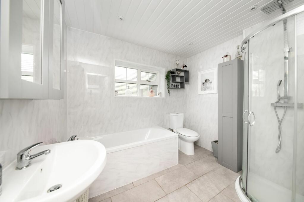 BEDROOM ONE EN-SUITE BATHROOM