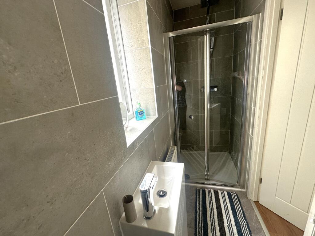 Cloakroom with shower