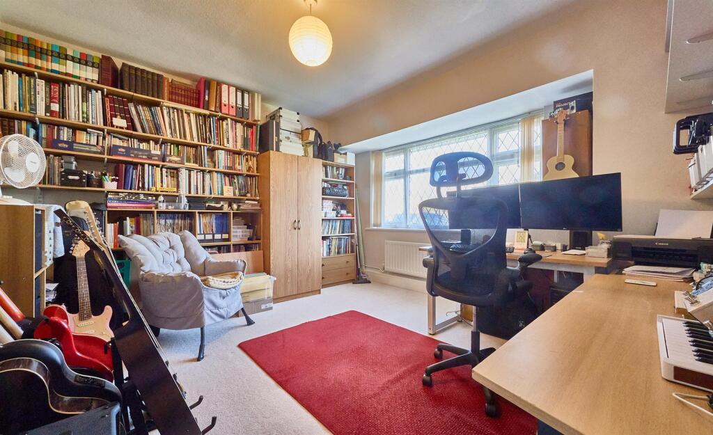 BEDROOM ONE TO FRONT