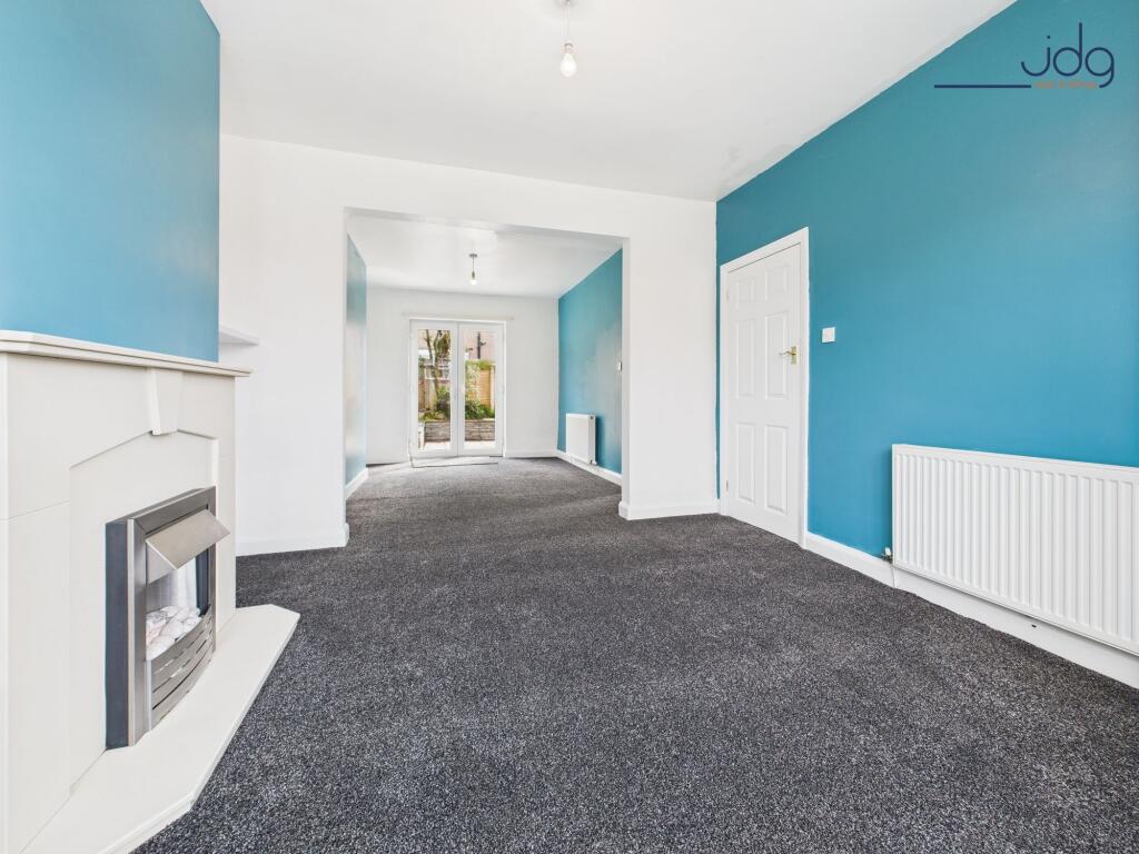 Open plan Living Dining with Gas Fire and french doors