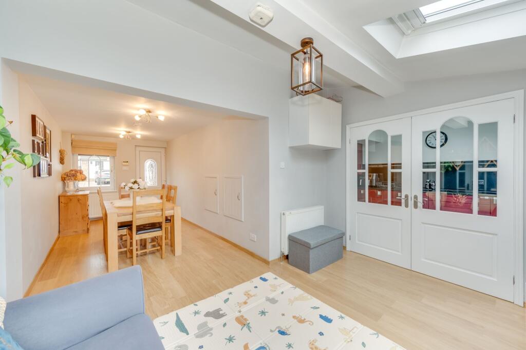 OPEN PLAN DINING ROOM AND SITTING ROOM
