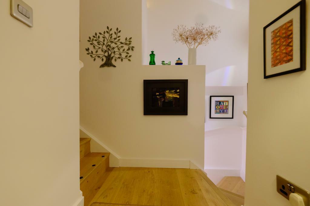 Steps down to 2 bedrooms