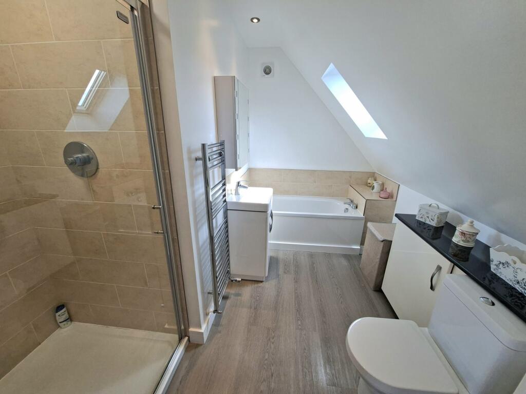 BEDROOM ONE AND EN-SUITE BATHROOM