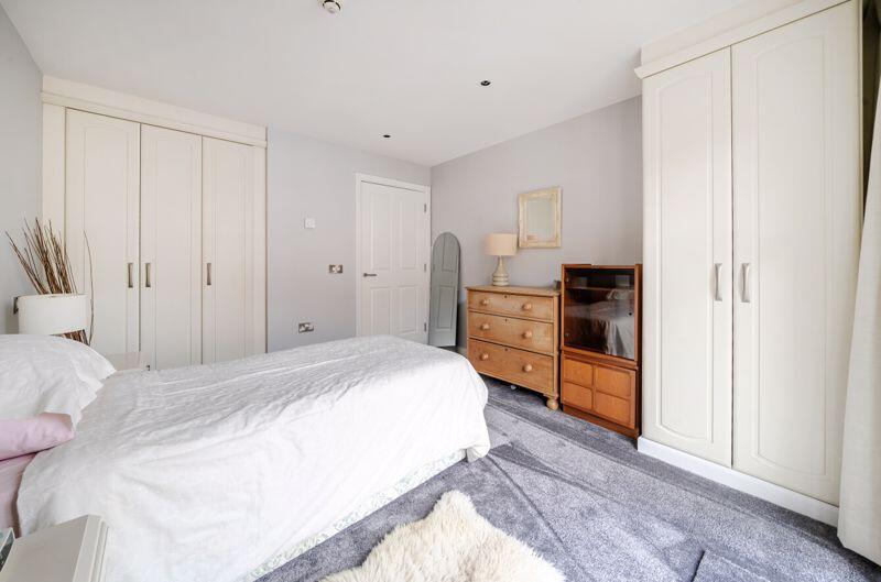 Bedroom with fitted wardrobes