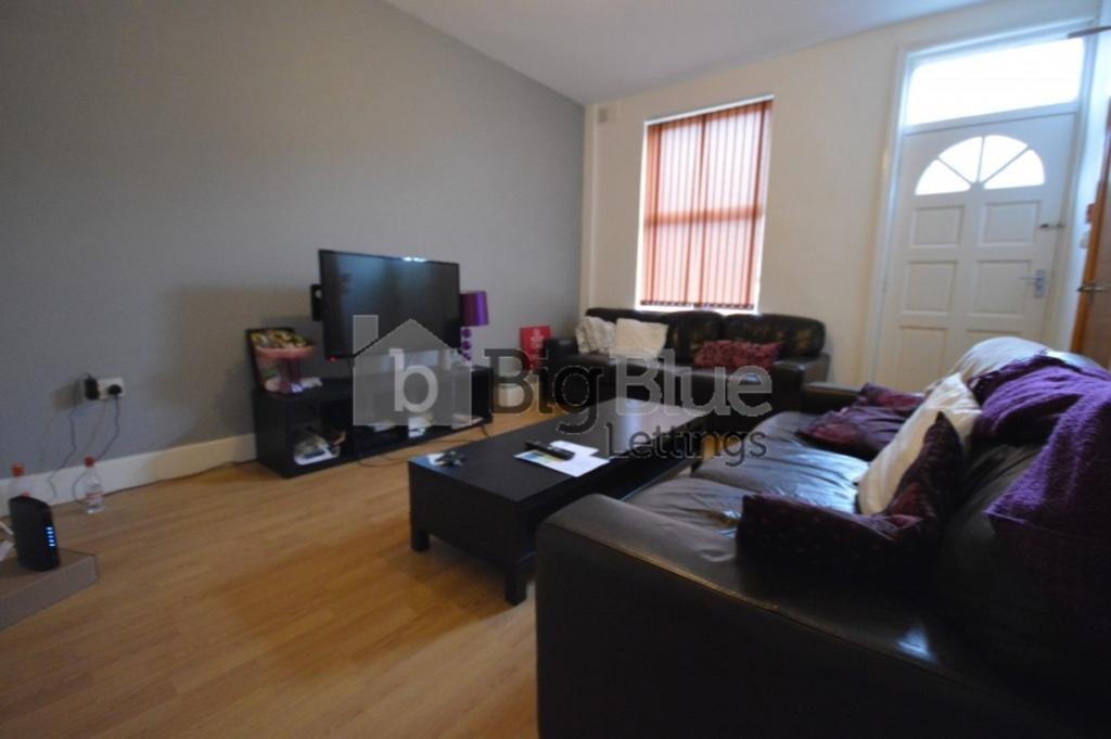A cozy living room featuring comfortable seatin...
