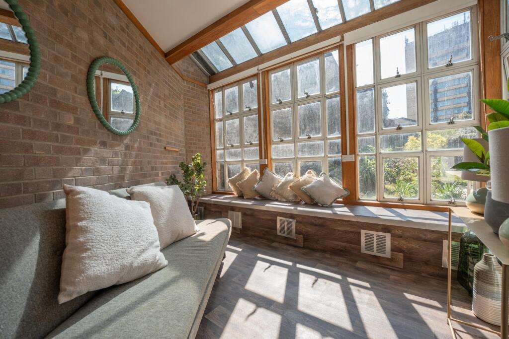 Bright and inviting communal lounge area featur...