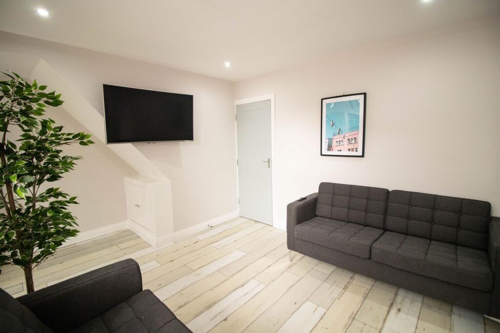Modern and welcoming living room featuring comf...