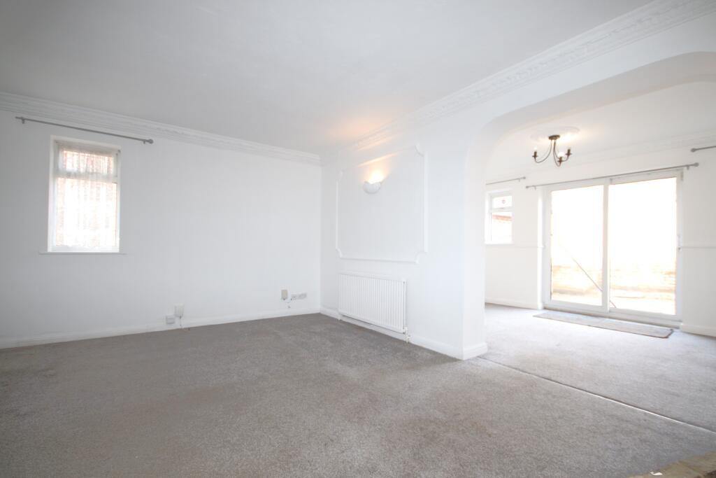 Both Living Rooms.JPG