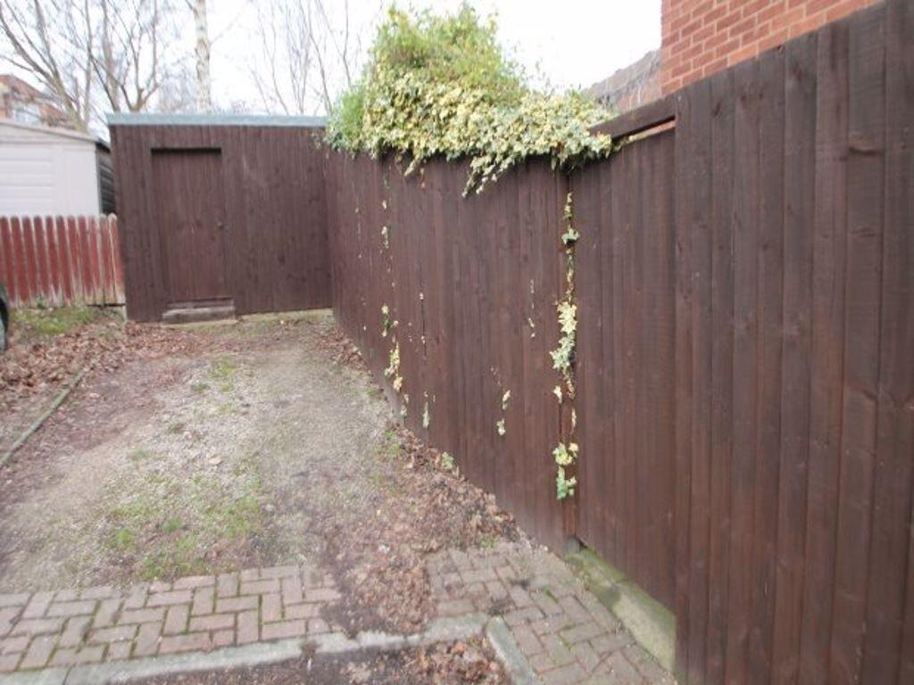 Private gated garden/outdoor area with timber f...