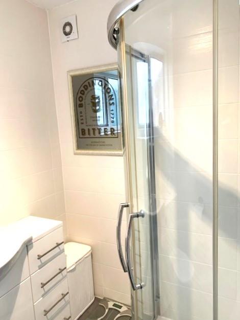 FULLY TILED SHOWER ROOM
