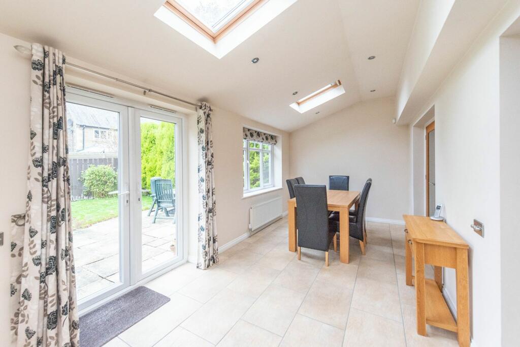 SITTING ROOM AND EXTENDED DINING KITCHEN