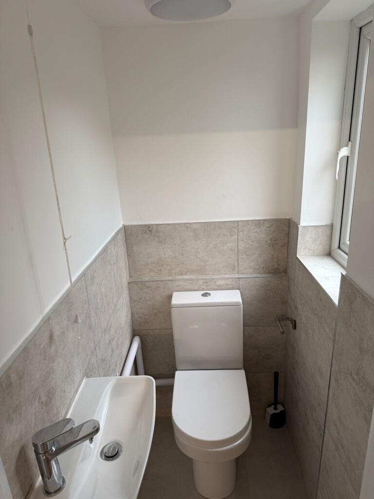 Welcoming bathroom featuring modern fixtures, a...