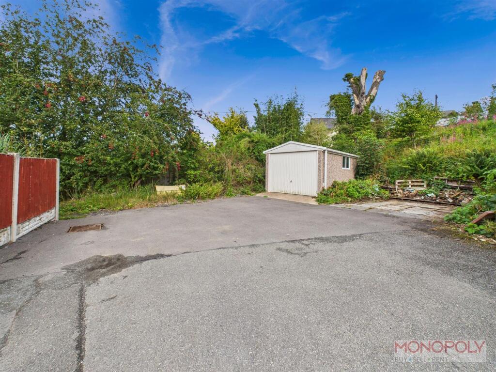 Garage and additional parking space