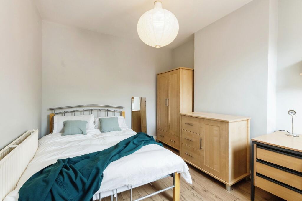 Bright and inviting double bedroom featuring a ...