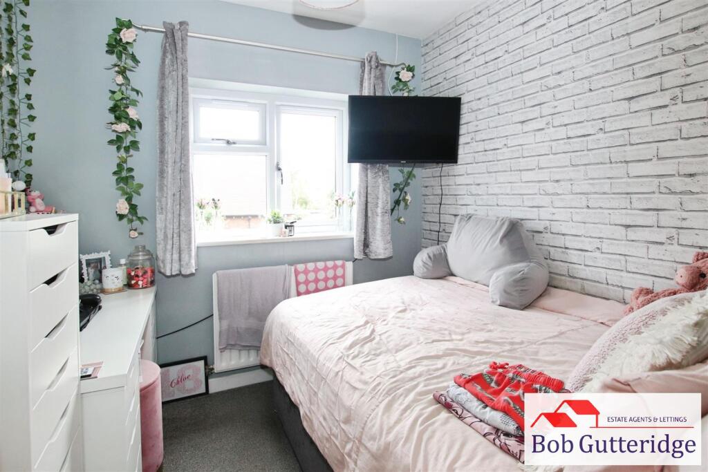 BEDROOM THREE (REAR)