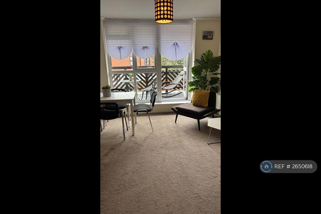 Living Room With Balcony Access