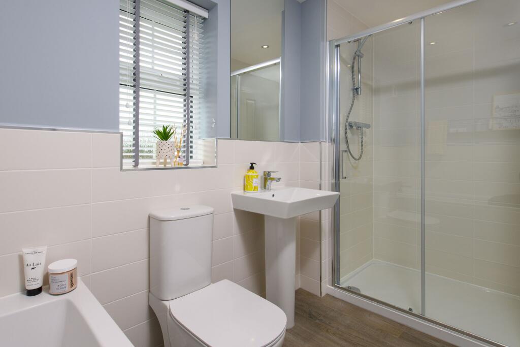 Bathroom with double shower in The Abbeydale 3 bedroom Show Home