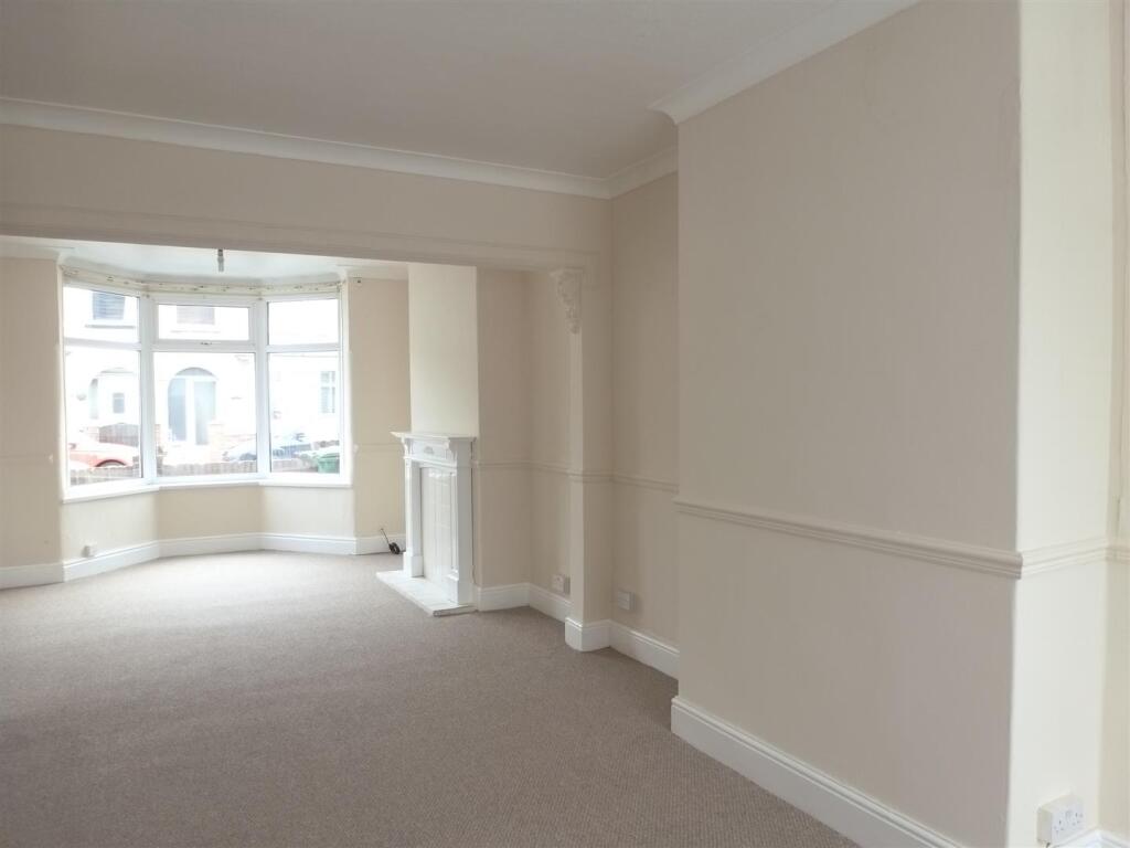 THROUGH LOUNGE/DINING ROOM