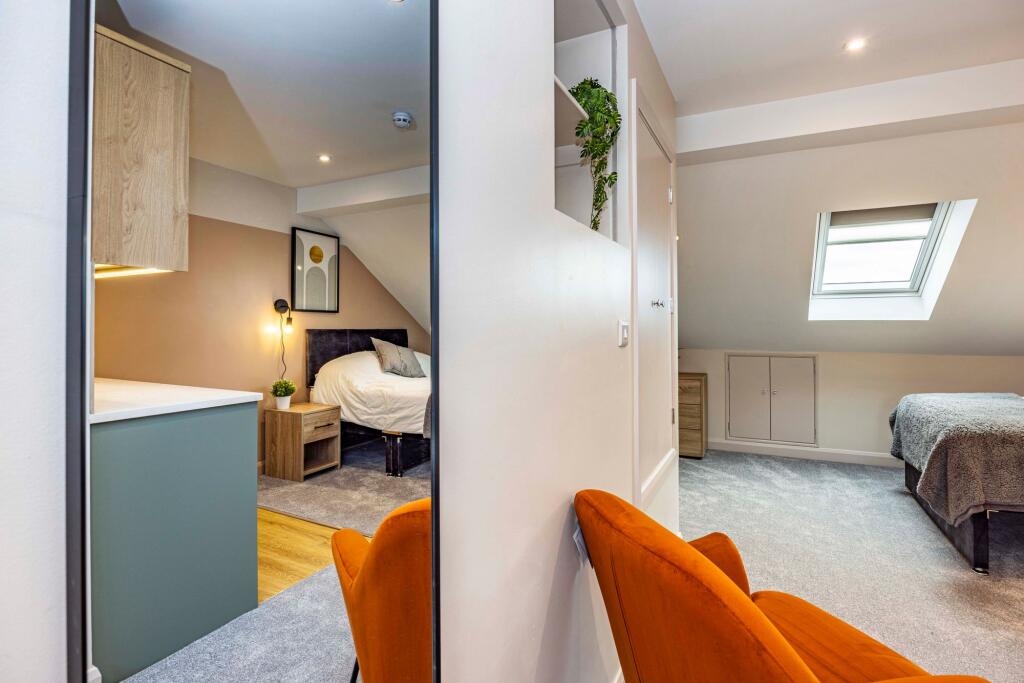 Bedroom With Kitchenette