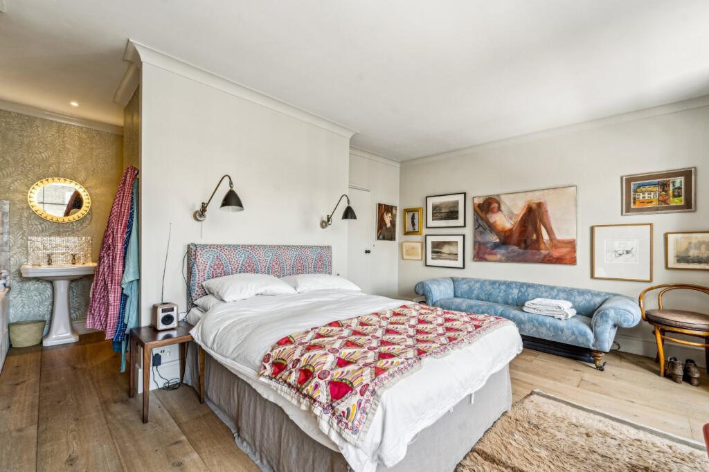 property in Elgin Crescent, 
Westbourne Park, W11