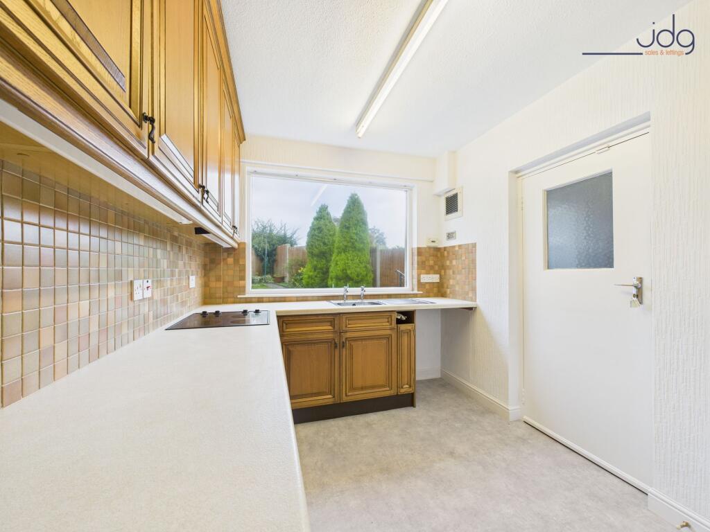 Kitchen with attached pantry