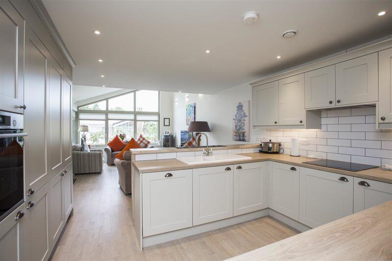 Kitchen through to living room