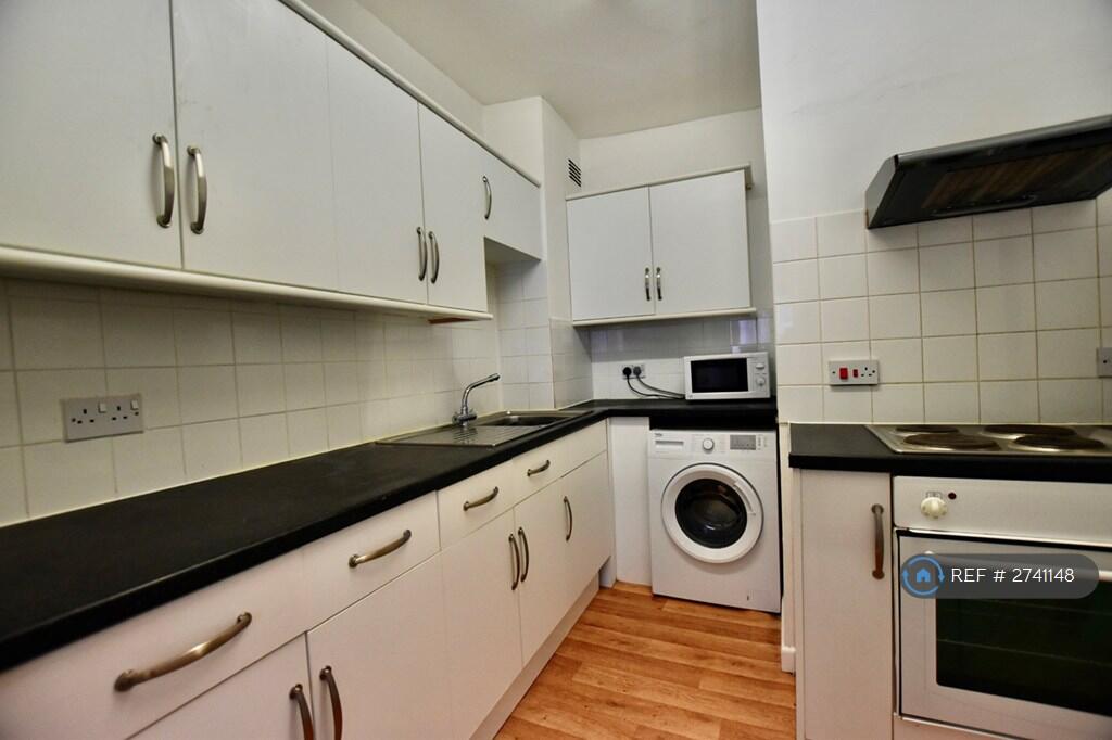 Washing Machine And Tumble Drier Provided