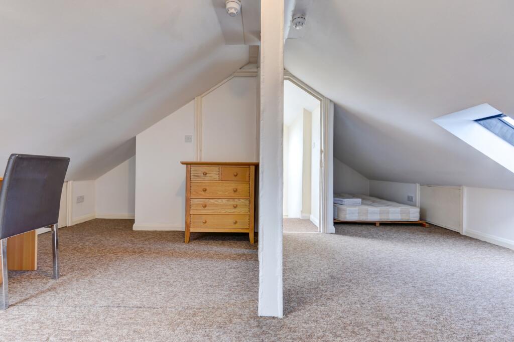 Bright and clean upper floor space with neutral...