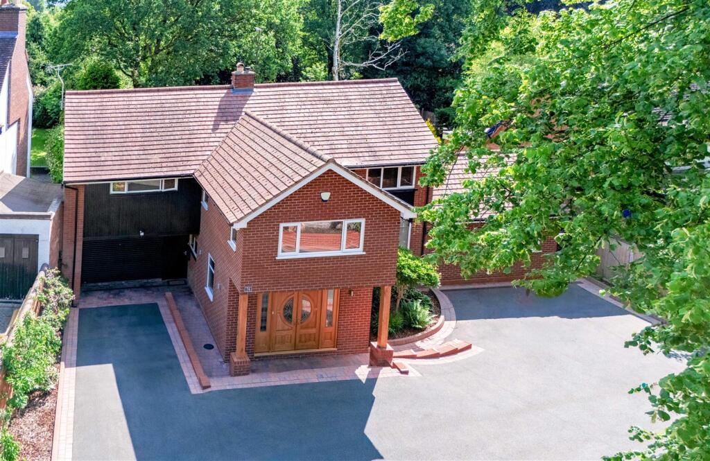 Front of house drone shot 1 DJI_20250616095012_010