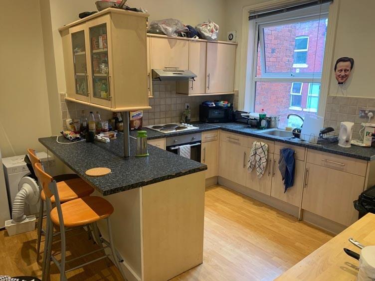 A bright and well-maintained kitchen with moder...