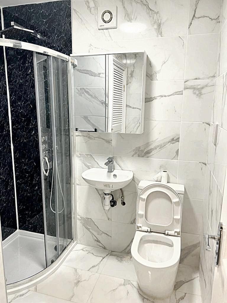 A beautifully designed bathroom featuring elega...