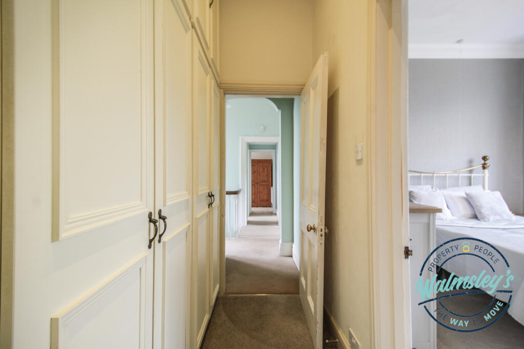 Landing from right wing with door into left wing &amp;