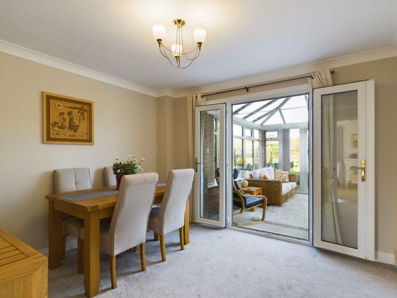Dining room through to conservatory