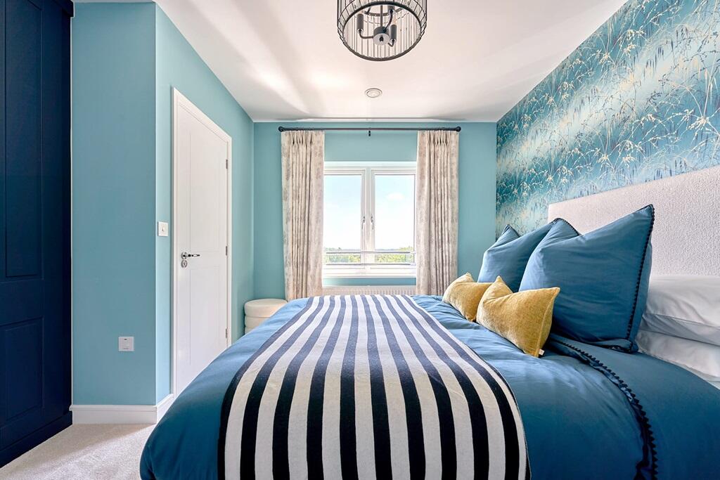 The main bedroom benefits from an en suite shower room