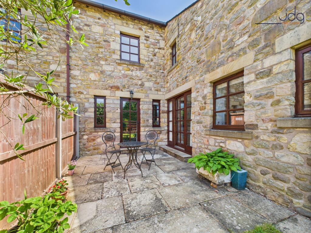 Patio seating area in the rear garden