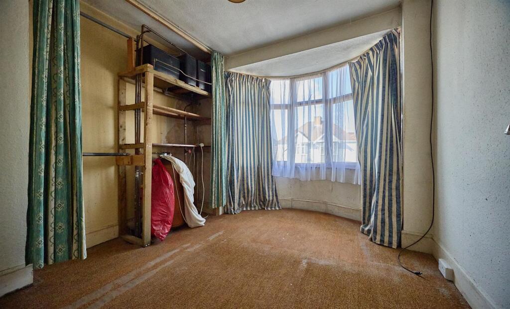 BEDROOM ONE TO FRONT