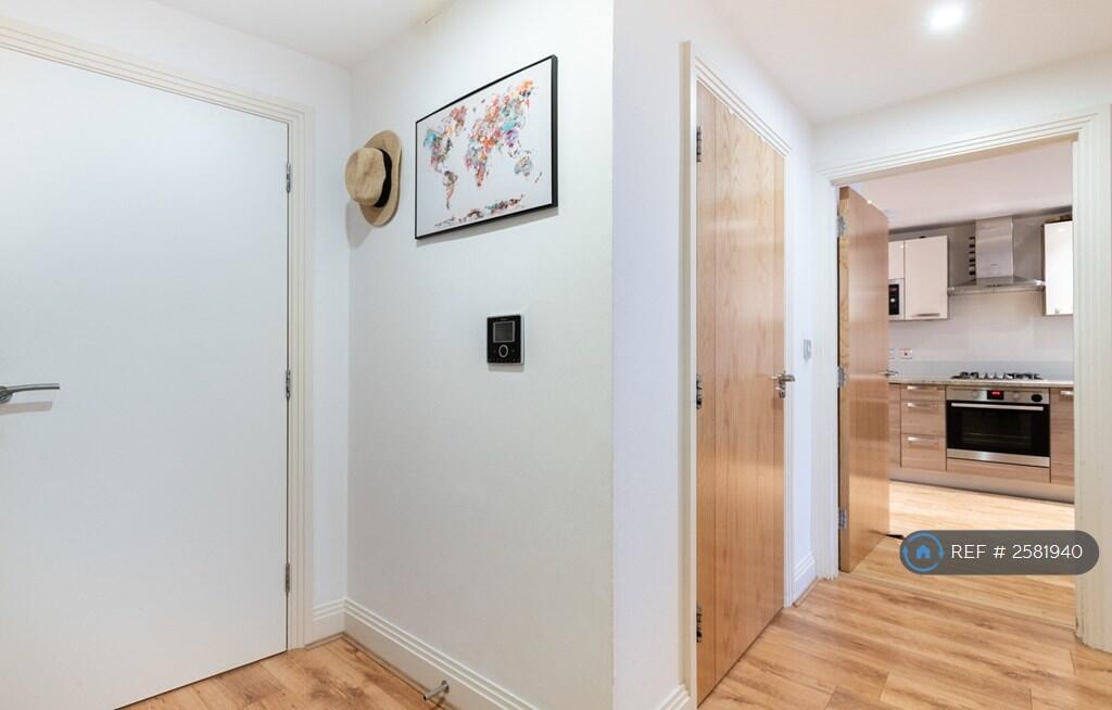 Hallway With Two Storage Rooms