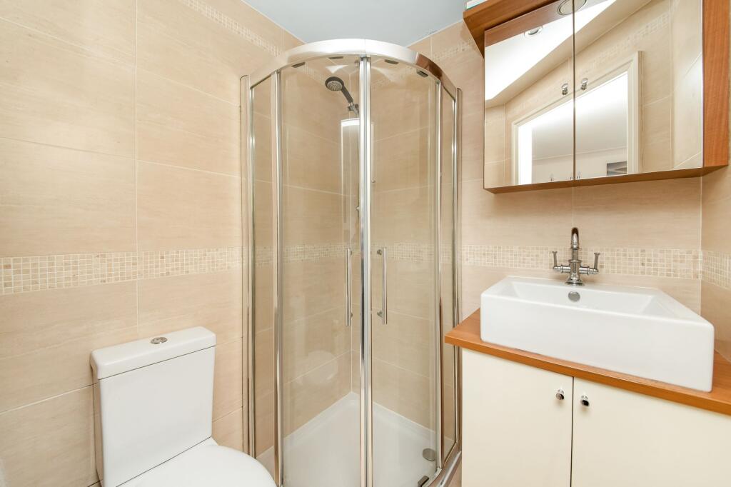 BEDROOM ONE EN-SUITE SHOWER ROOM